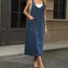 41FWtFzJcL.jpg Women's V Neck Sleeveless Denim Overall Dress Adjustable Strap Vintage Back Slit Midi Jean Dress with Pockets